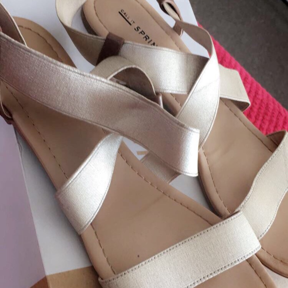 Gold summer sandals by Call It Spring.